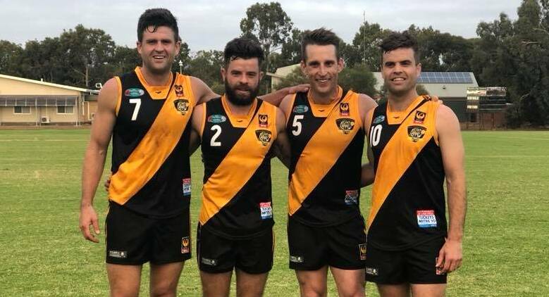 Brock O'Brien (far left) pictured with brothers Mackenzie, Rory and Josh before a game in 2018. Photo: Supplied.