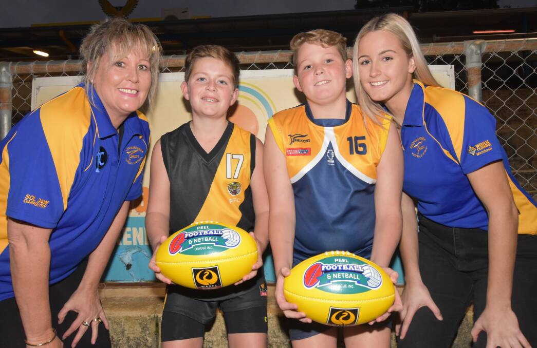 Pinjarra and South Mandurah Year 7s players Taj Guthrie and Jaxon Mitchell pictured with Kylie and Kameron Bazzo. Photo: Justin Rake.