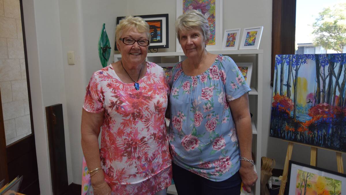 Local artists Eileen Macpherson and Vanessa Black showed off their works. Photo: Justin Rake.