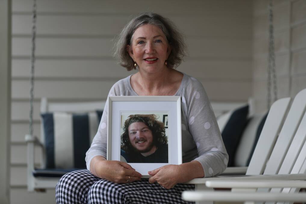 BLOODY HARD: Sandy McPake with a picture of her son, Beau Jaypeltier, who died of brain cancer aged just 29. Sandy supports the NSW Voluntary Assisted Dying bill. Picture: Robert Peet.