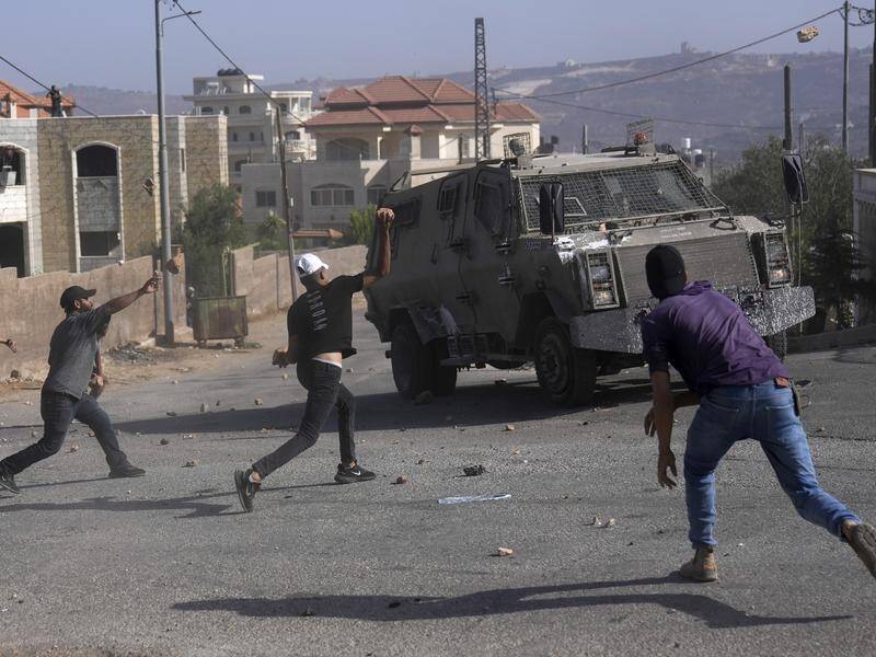 Two Palestinians have been killed in the latest Israeli military raids in the West Bank. (AP PHOTO)