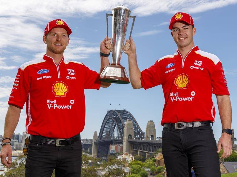 Runaway Supercars series leader Scott McLaughlin (R) says he won't back off after his Bathurst win.