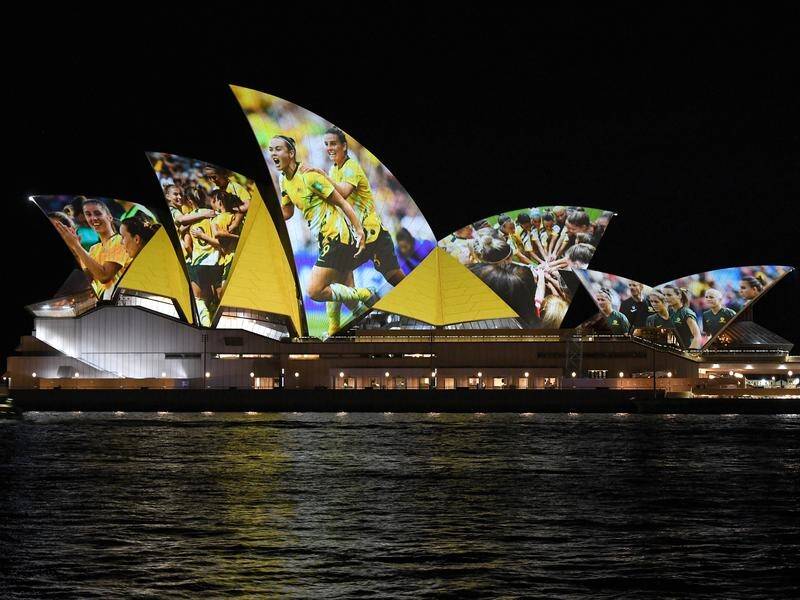 The Opera House lights up after the Australia-NZ bid wins the 2023 Women's World Cup hosting rights.