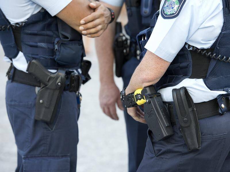 Queensland police have seized more than 500 weapons since stop-and-search powers were expanded. (Dave Hunt/AAP PHOTOS)
