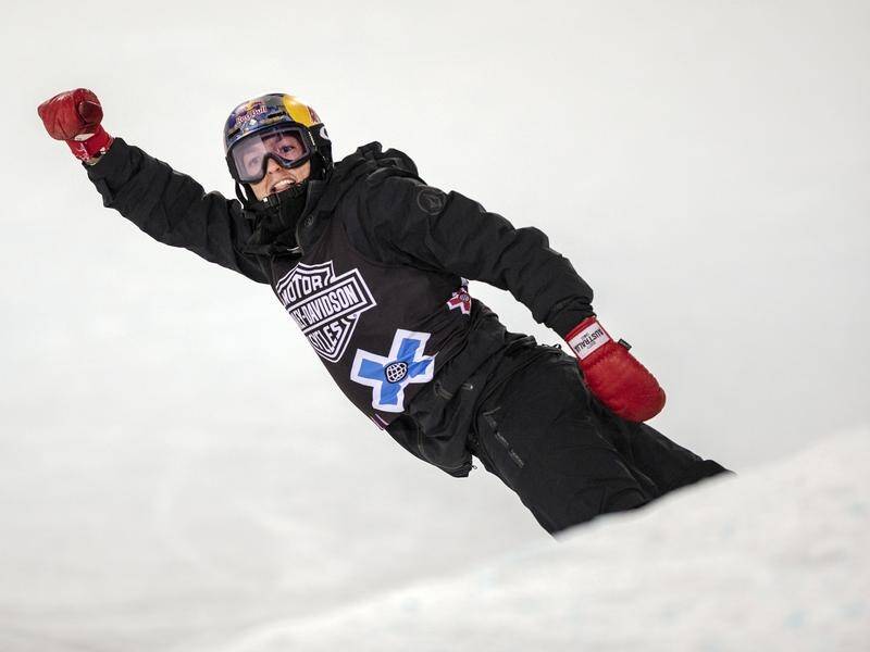 Scotty James celebrates after his wining run in the men's superpipe final at the X Games.