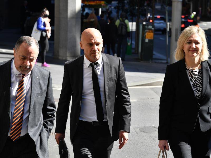 Ex-NSW detective Gary Jubelin (centre) is fighting his convictions and sentence over recordings.