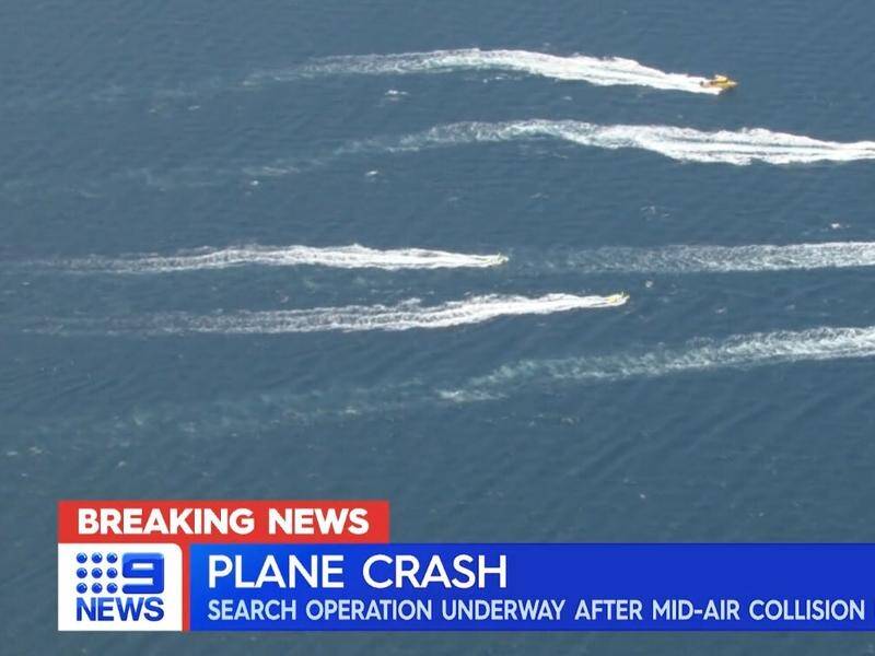 The search continues for two people missing after an aircraft crashed into Port Phillip Bay. (HANDOUT/CHANNEL NINE)