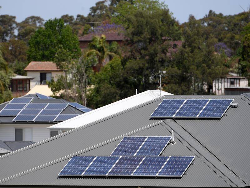The government will commit $1 billion to ensure more solar panels are made in Australia. (Dan Himbrechts/AAP PHOTOS)