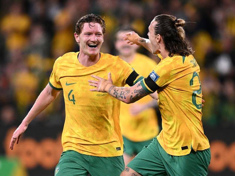 The versatile Kye Rowles is all smiles after scoring his first goal for Australia. (Dan Himbrechts/AAP PHOTOS)