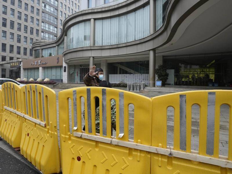 Hotel barriers may not be the only thing blocking the WHO team's coronavirus investigation in Wuhan.