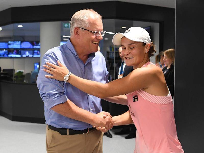 Prime Minister Scott Morrison saluting Aussie tennis golden girl Ashleigh Barty.