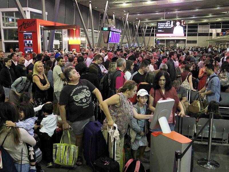 Passengers at Sydney Airport have faced major delays after a "technical" issues halted security.