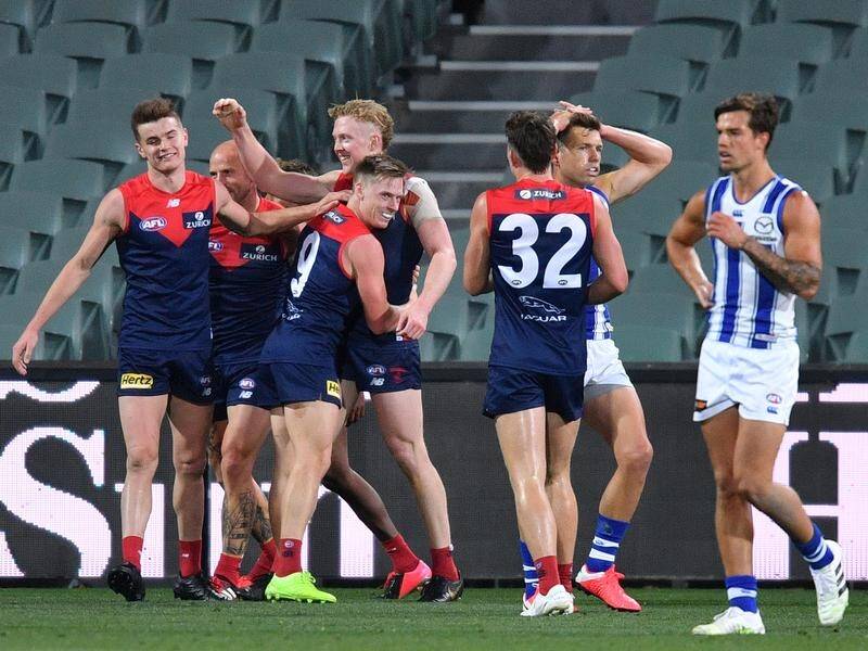 Melbourne are on the march after successive AFL wins in Adelaide, the latest over North Melbourne.