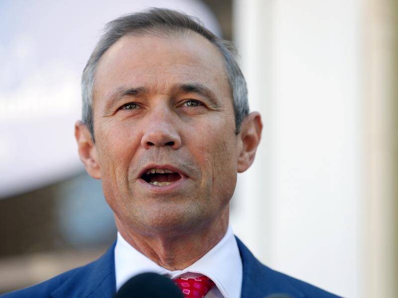 WA Health Minister Roger Cook says virus travel restrictions will stay in place for some time.