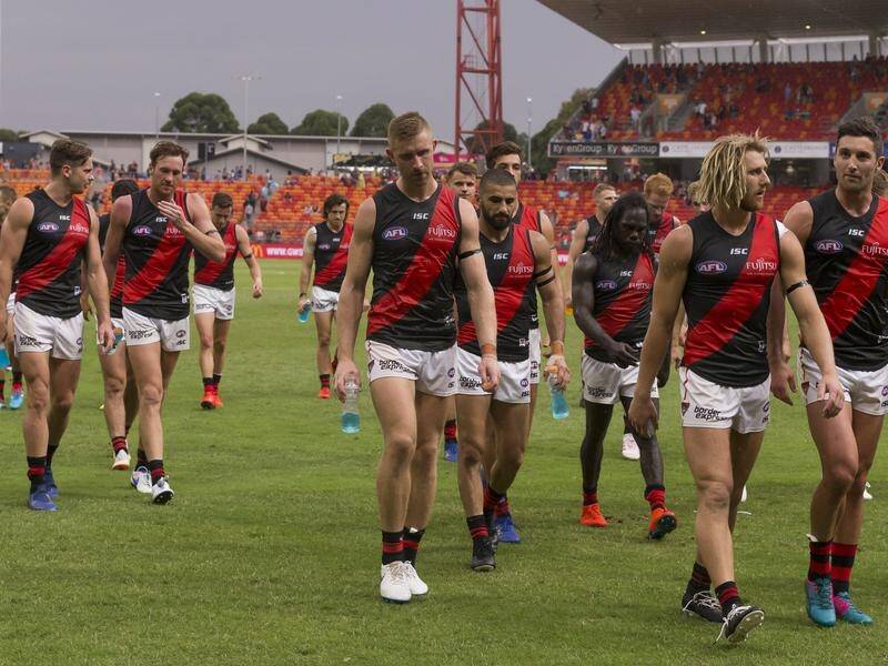 Dejected Essendon players after their round one AFL thrashing by GWS.