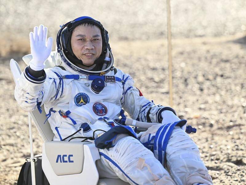 Chinese astronaut Tang Hongbo has returned to earth after a six-month space mission. (AP PHOTO)
