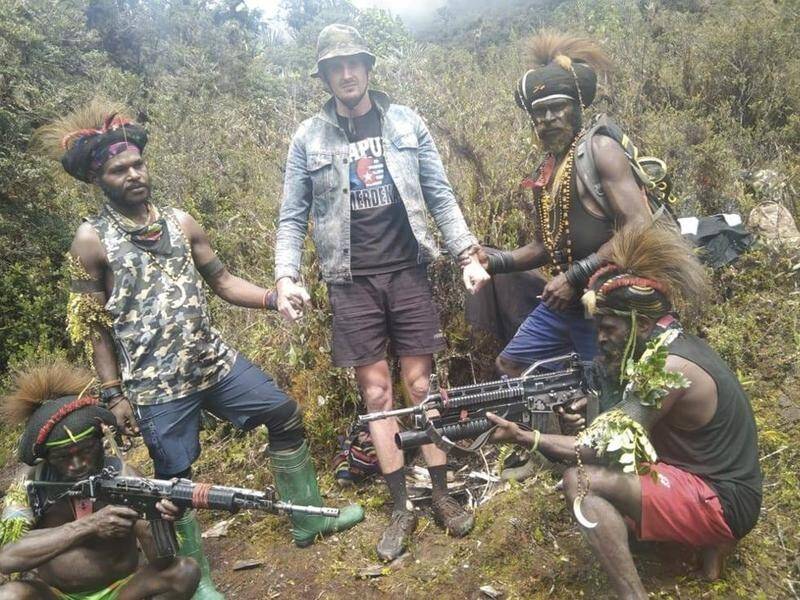 Separatist rebels have been holding New Zealand pilot Phillip Mehrtens (centre) hostage in Papua. (AP PHOTO)