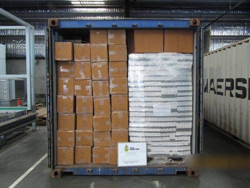 A man has been charged after 10 million cigarettes were found in shipping containers in Melbourne.