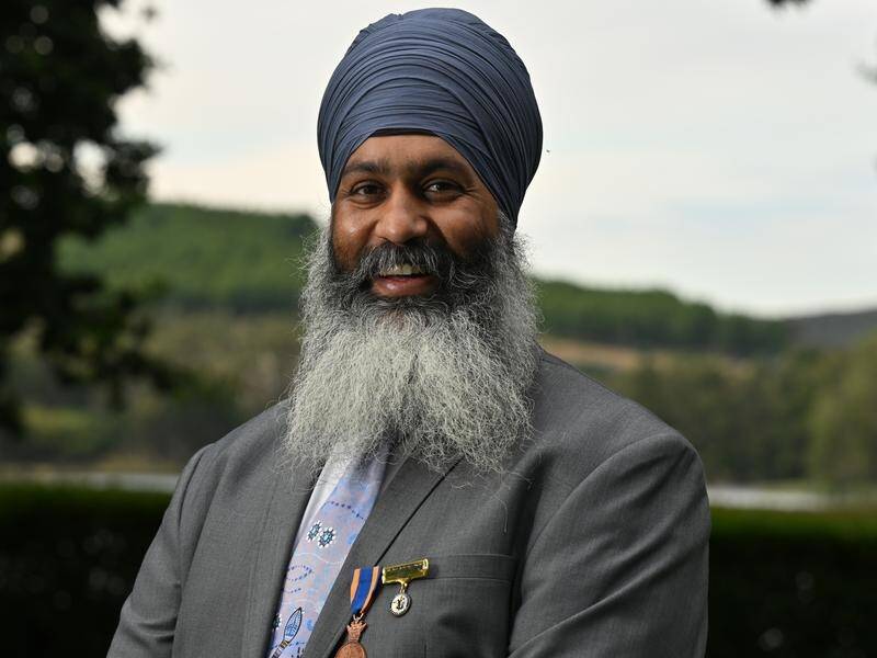 Australia's Local Hero of 2023, Amar Singh, says dads need time to connect with their children. (Mick Tsikas/AAP PHOTOS)