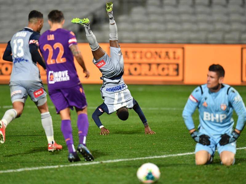 Melbourne Victory's Elvis Kamsoba celebrated his strike against Perth Glory in style.