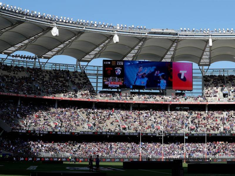 Two men who used fraudulent means to enter WA to attend the AFL grand final have been jailed.