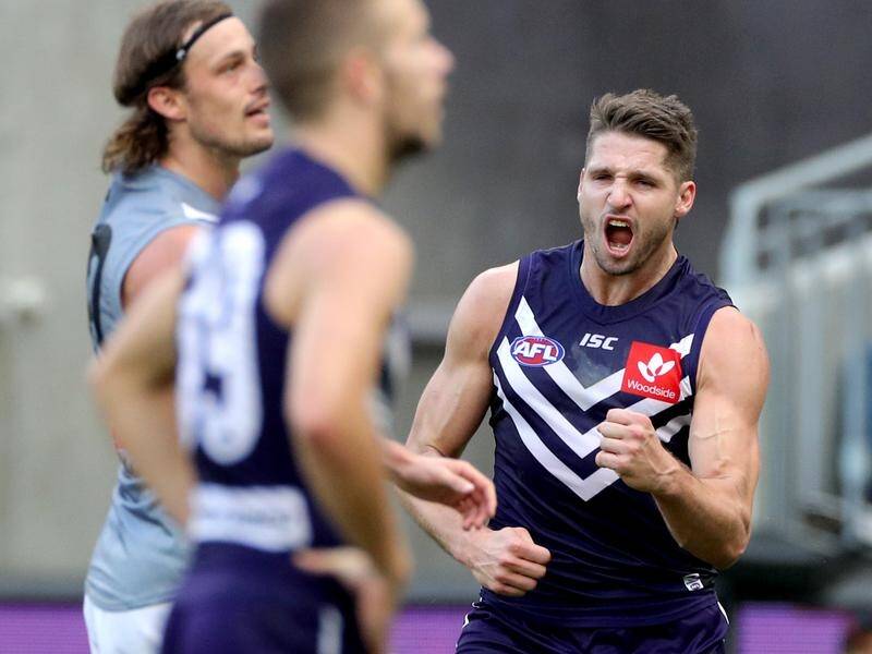 Fremantle's Jesse Hogan will play against Brisbane this weekend but it's unclear at what level.