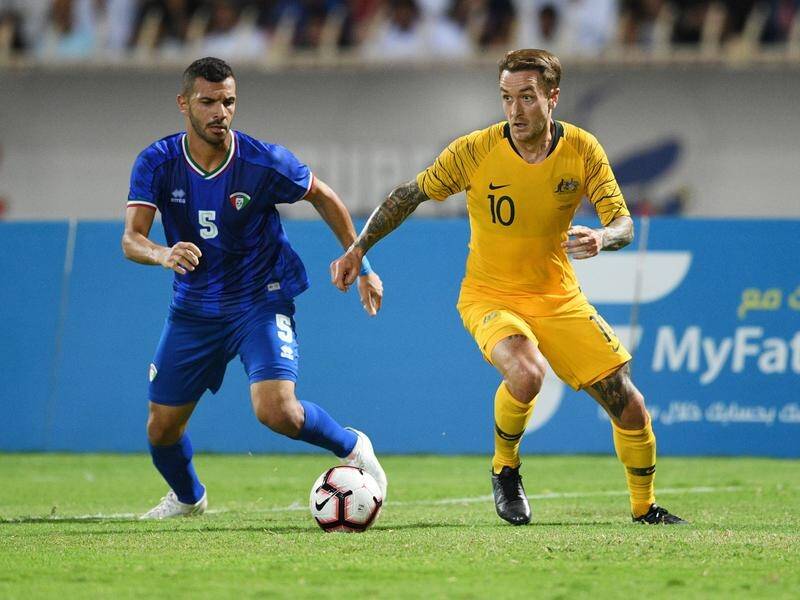 Adam Taggart (right) may come into the Socceroos side for the match against Taiwan.