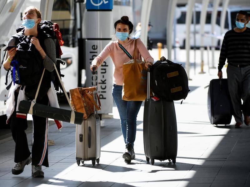 Australian citizens are under intense hardship overseas due to travel bans, an inquiry has heard.