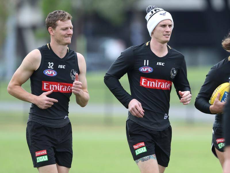 Will Hoskin-Elliott (L) has been recalled for Collingwood's AFL Anzac Day clash.