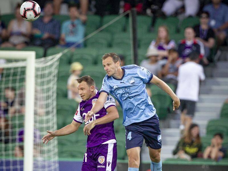 Brendon Santalab (L) has scored his first goal in Perth colours as they beat Sydney in the A-League.