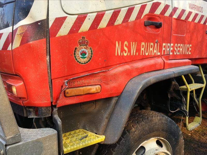 A NSW Rural Fire Service truck has collided with a car near Lithgow, killing two people.
