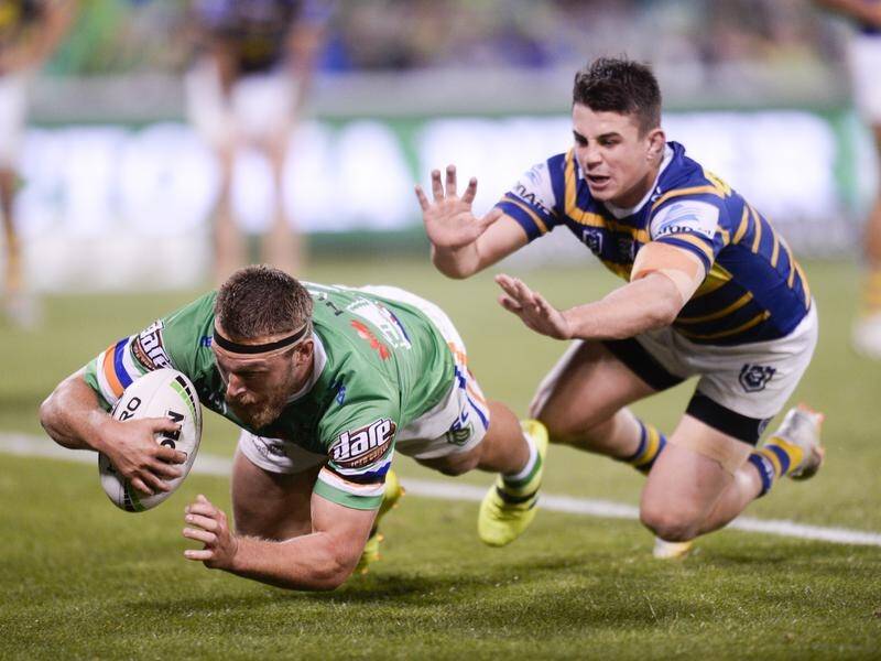 Elliott Whitehead dots down for the Raiders in their comfortable NRL win over the Eels.
