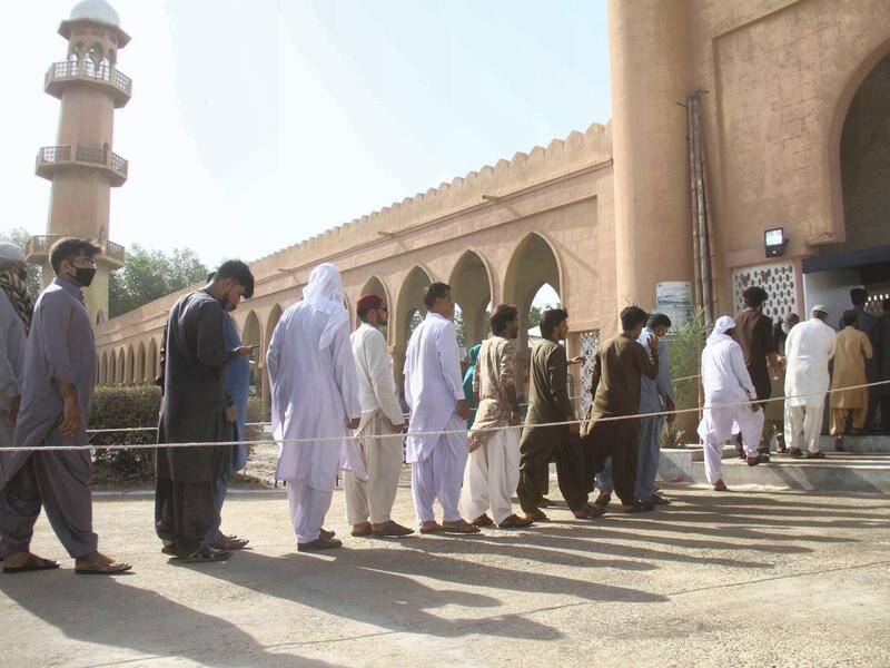 A mosque in Pakistan has placed a disinfecting gate in front of its entrance amid the pandemic.