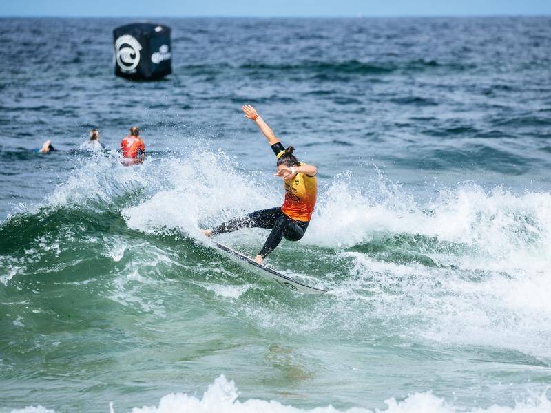 Australia's world No.1 ranked women's surfer Tyler Wright has been knocked out of the Newcastle Cup.