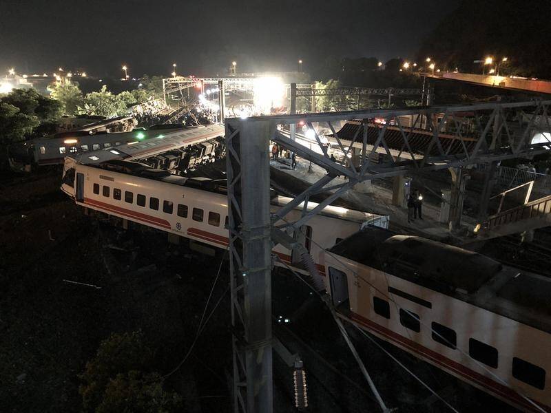A train carrying 366 people has derailed in northeast Taiwan, killing at least 18 and injuring 160.