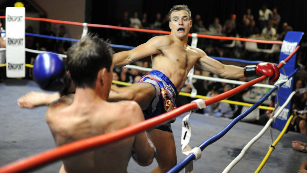 Bunbury played host to the Respect Fight Night on Saturday with a number of local Muay Thai fighters pitting their skills against Perth’s best. Pictured is Brady Wooding and Mike Maccario. Picture: Ted May/Bunbury Mail.