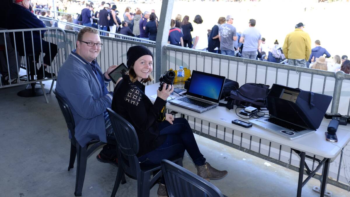 Footy HQ - WA reporters Andrew Elstermann and Jemillah Bickerton inside the special media section of the South Bunbury Football Club members balcony at Hands Oval. Photo: Ashley Pearce.