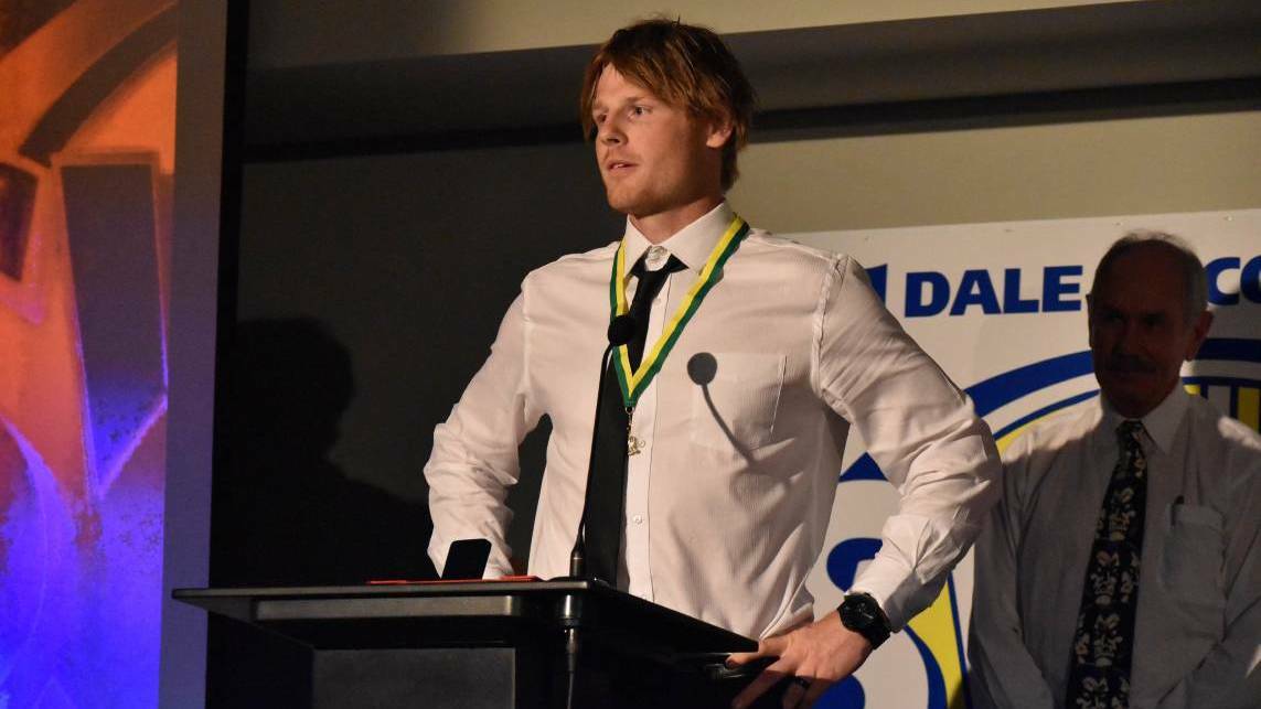 Busselton Football Club midfielder Chris Kane accepting the Hayward Medal as the South West Football Leagues' fairest-and-best in 2015. Photo: Andrew Elstermann.