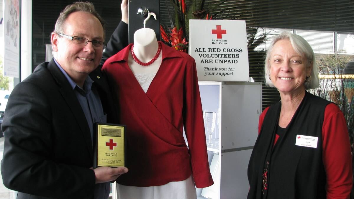 Mandurah MLA David Templeman and Mandurah Red Cross Shop supervisor Sue Williams.