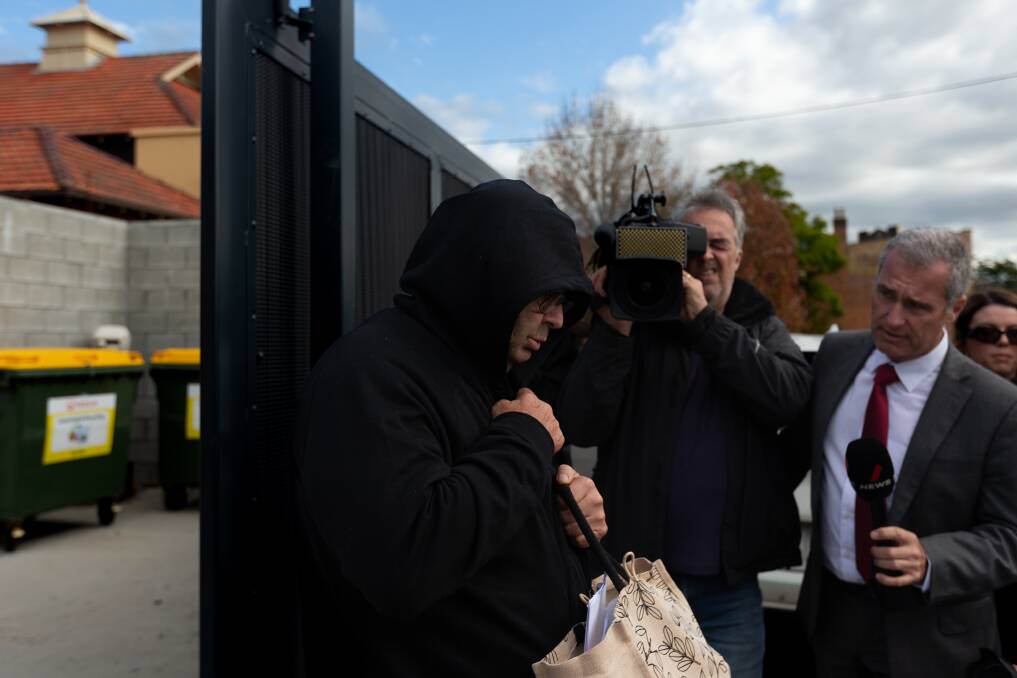 Brett Button leaves Cessnock police station in June after being charged over the bus crash at Greta that killed 10 people. Picture by Jonathan Carroll