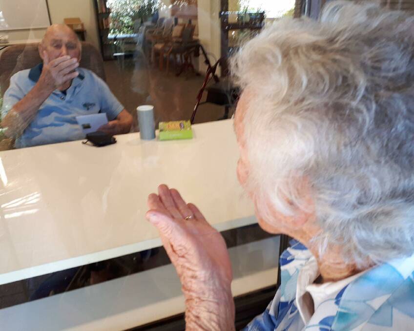 A rare chance to blow a kiss - 93-year-old Tom and 90-year-old Irene have been married since 1951.