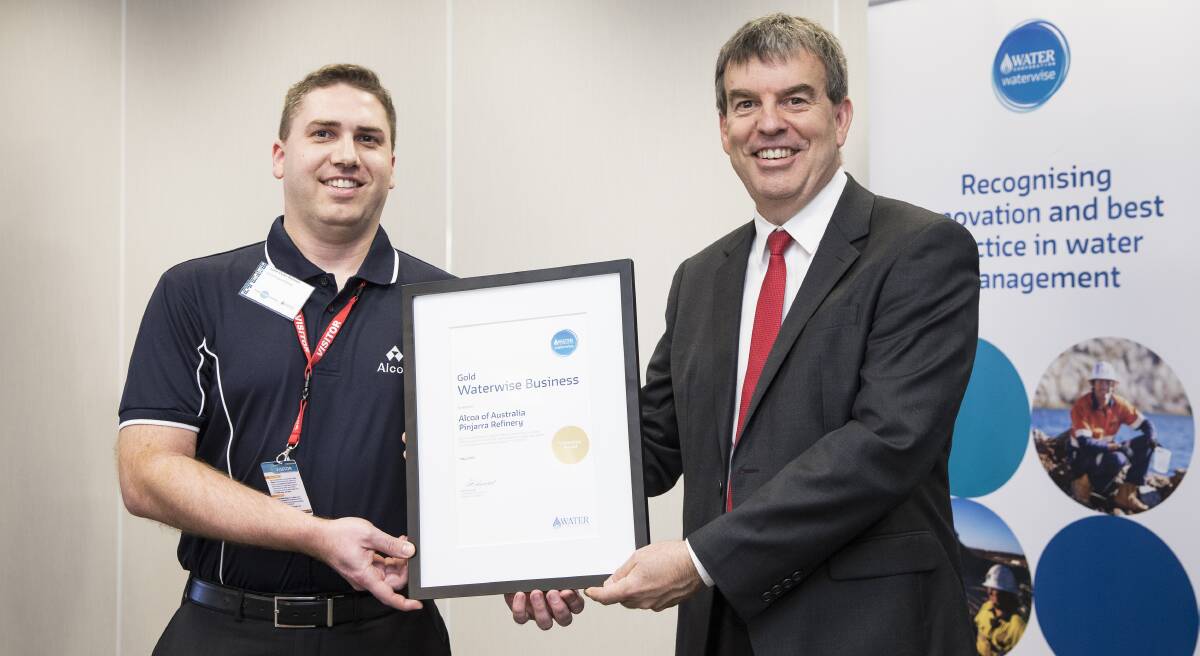 Recognition: Alcoa's John Peter Kelmar accepts the award from Water Minister Dave Kelly. Photo: Supplied.