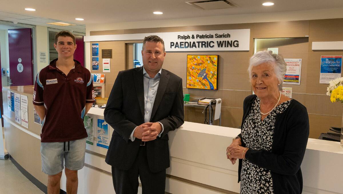 Significant milestone: Former PHC Sarich Wing patient and aspiring cricketer Teague Wyllie (17), who was one of the first patients admitted, Chief of Peel Health Campus Andrew Tome and Chair of the former Peel Health Foundation Ann Fletcher. Photo: Supplied.