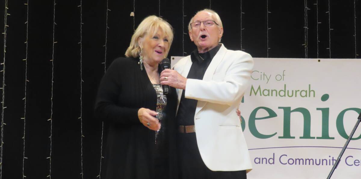 Hitting all the notes: Kelly Green and Eddie Storm OAM belt out the 60s hit 'Bye Bye Love' at their recent Mandurah Seniors Centre concert. Photo: Supplied.