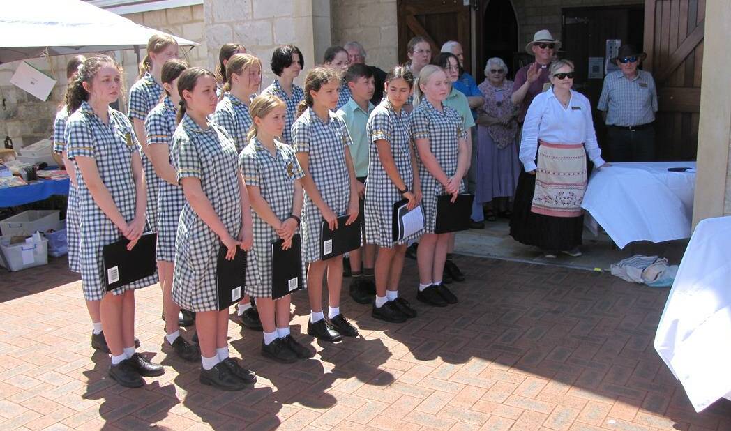 Frederick Irwin Anglican school choir helping to mark the ocassion. Photo: Supplied.