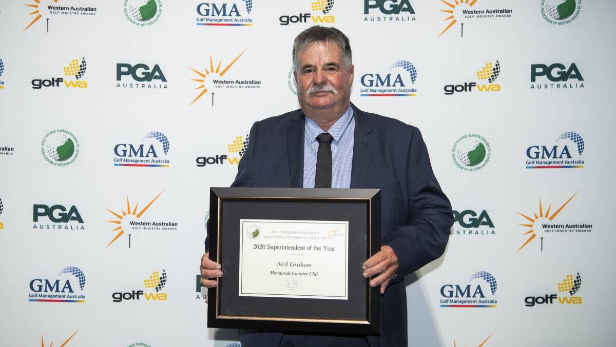 Super work: Neil Graham claiming the Superintendent of the Year Award. Photo: Supplied.