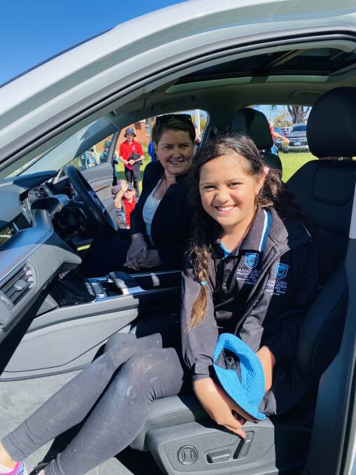 Inspiring innovation: Principal Natasha Upcott and student Kyra Reihana checking out the Audi e-tron electric car. Photo: Supplied.