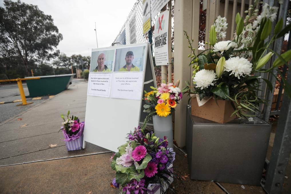 WELL RESPECTED: Floral tributes and messages from the families of Ben Pascall, 28, and Lyndon Quinlivan, 35, were placed outside the workers' entrance to Norske Skog last year. Picture: THE BORDER MAIL