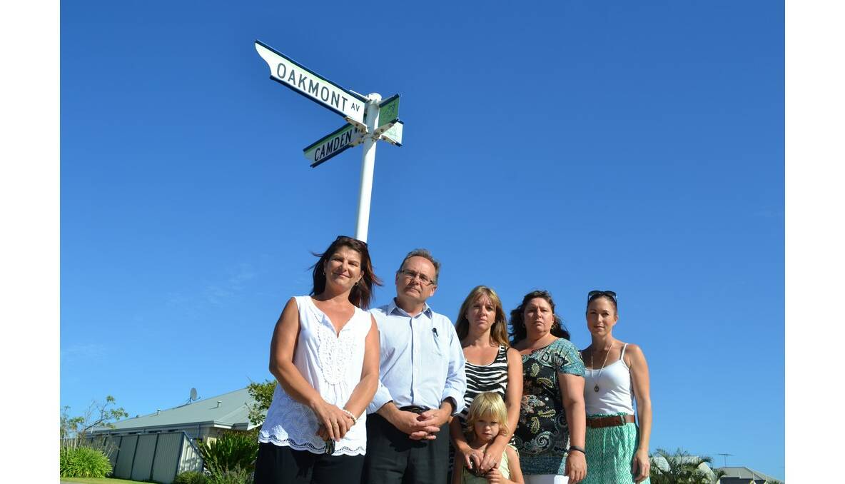 Not safe to cross: Mandurah MLA and parents gathered this morning to rally over the lack of crossing guards on Oakmont Avenue, Meadow Springs.